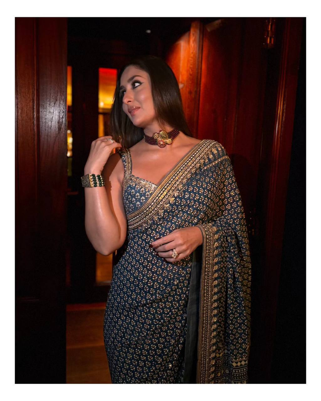 Traditional navy ajrakh saree with contemporary mirror detailing