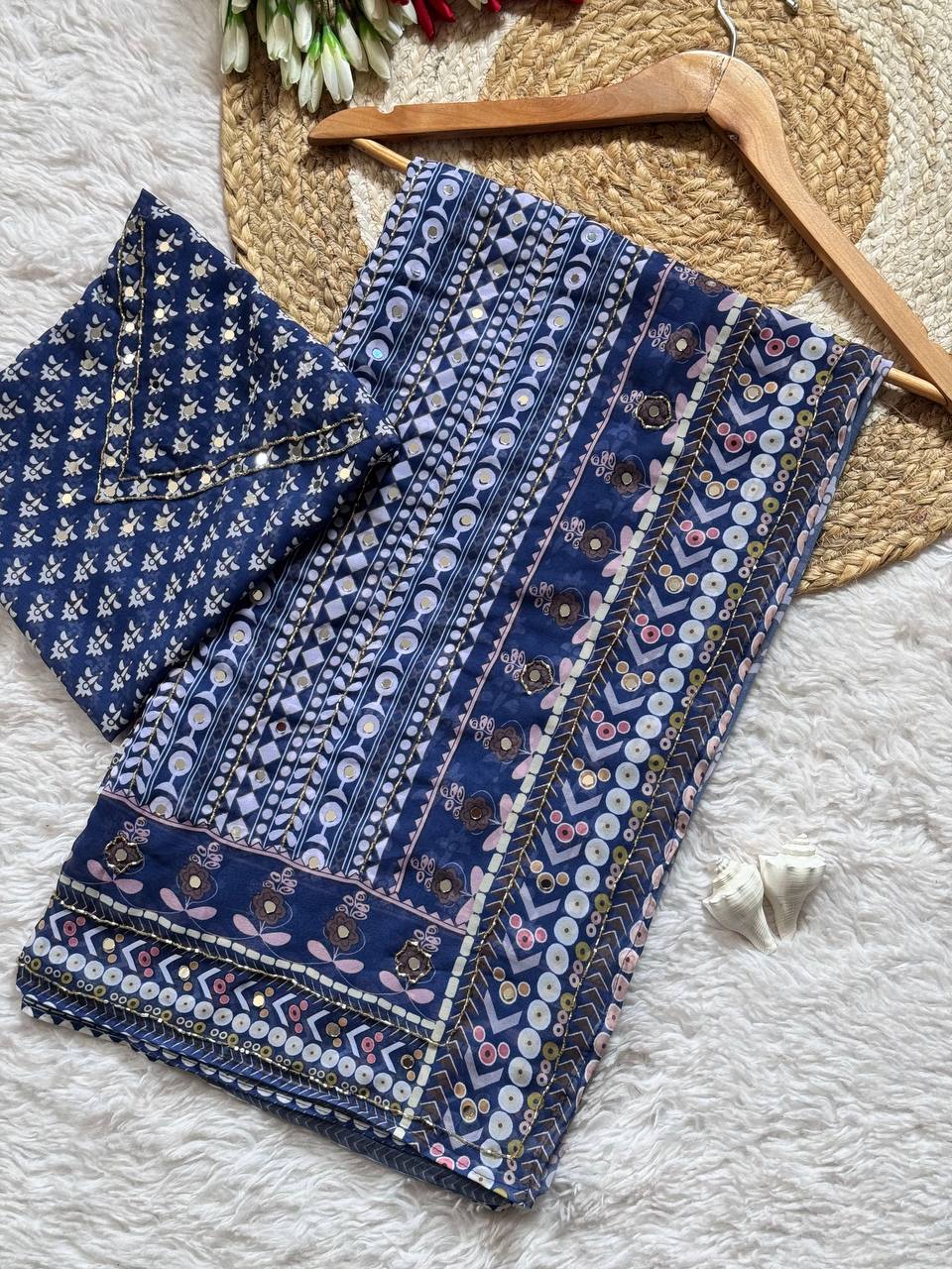 Traditional navy ajrakh saree with contemporary mirror detailing