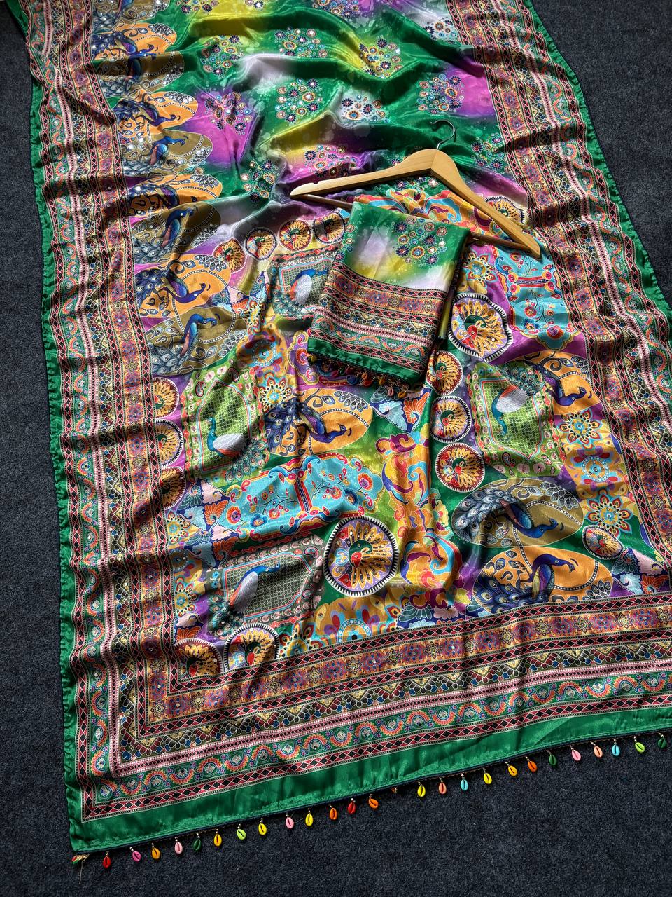 Emerald green artistic digital print modal silk saree with heritage border multicolor motifs decorative tassels