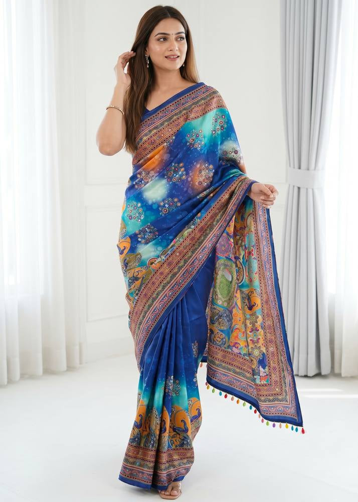Royal blue artistic digital print modal silk saree with multicolor heritage border designer pallu tassel detailing mameraa