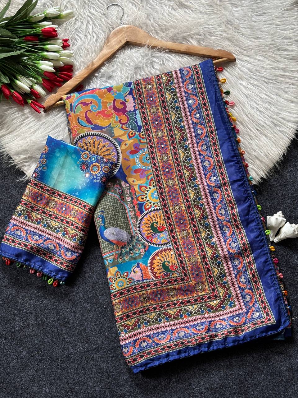 Royal blue artistic digital print modal silk saree with multicolor heritage border designer pallu tassel detailing