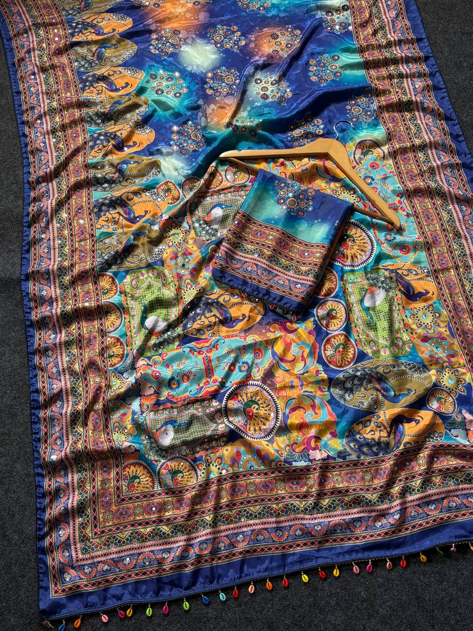 Royal blue artistic digital print modal silk saree with multicolor heritage border designer pallu tassel detailing