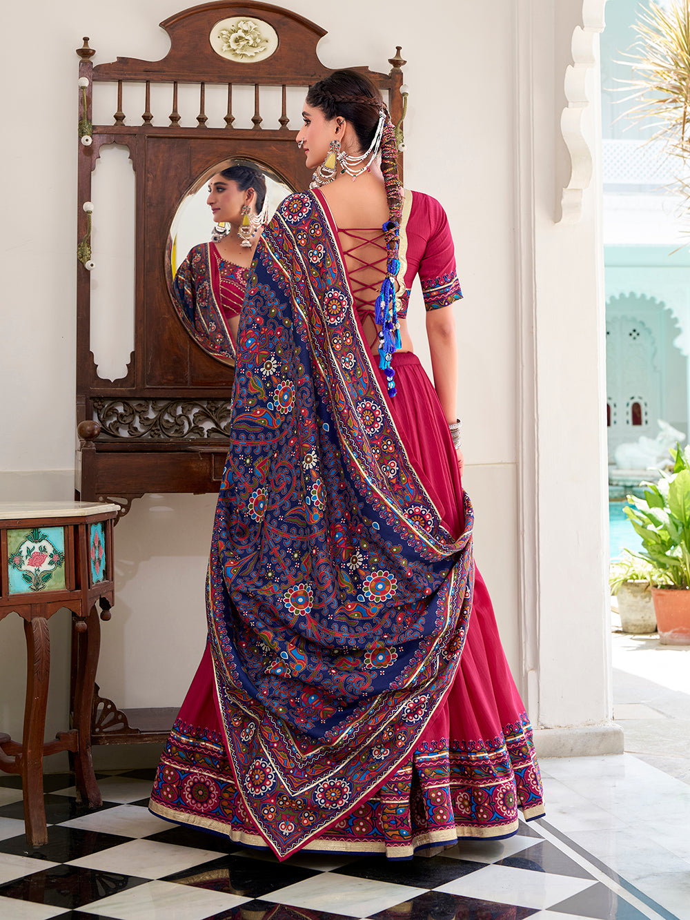 Pink tasar silk gamthi print lehenga choli with embossed design gotta patti work