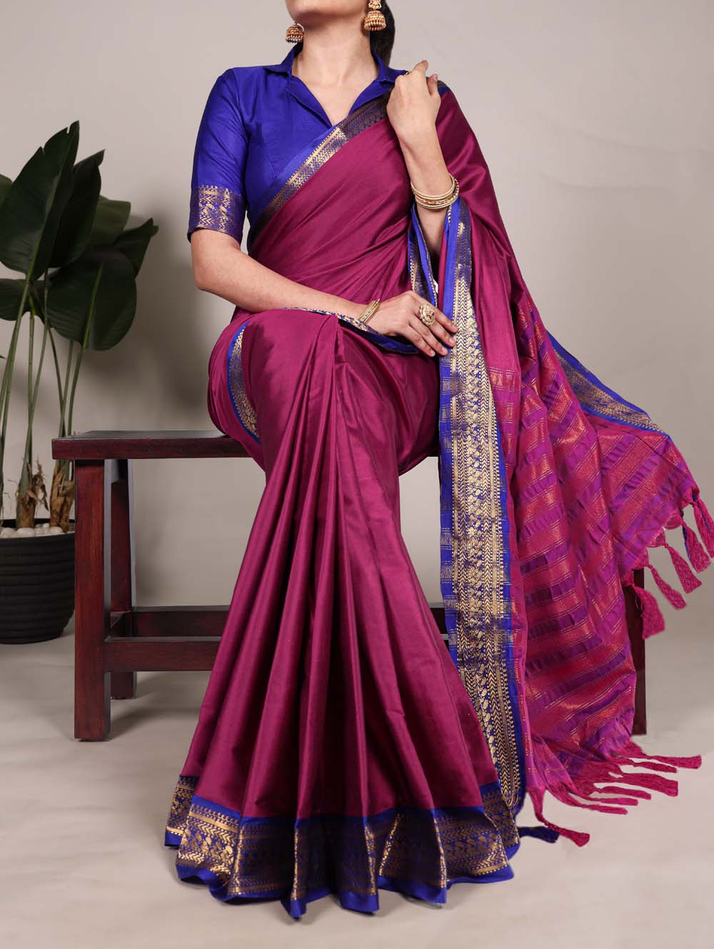 Pink aura silk saree with zari weaving and blue blouse