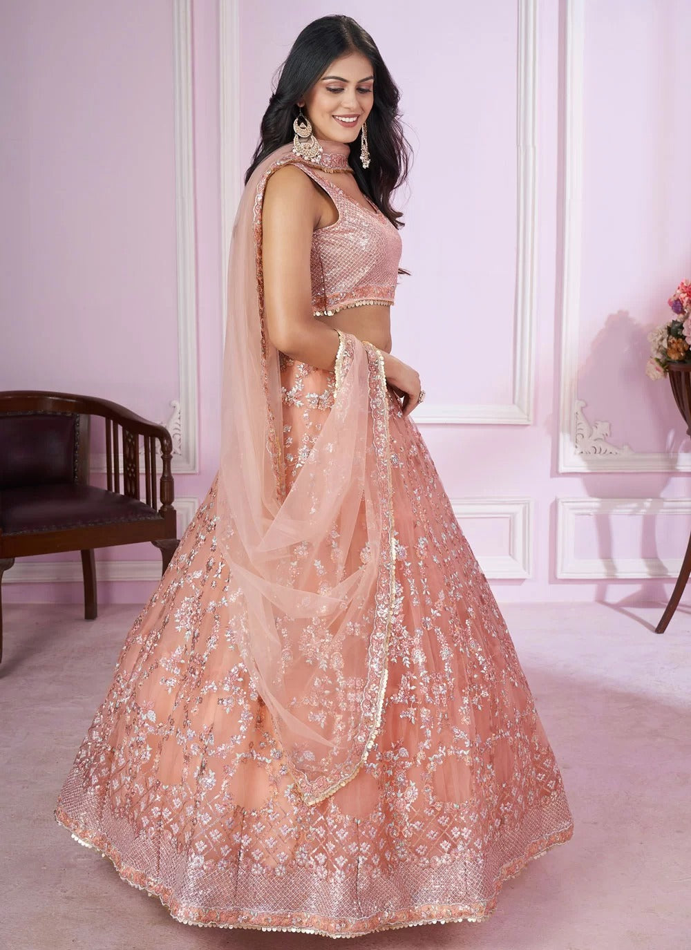 Pink soft net sangeet lehenga choli with sequins zari embroidery