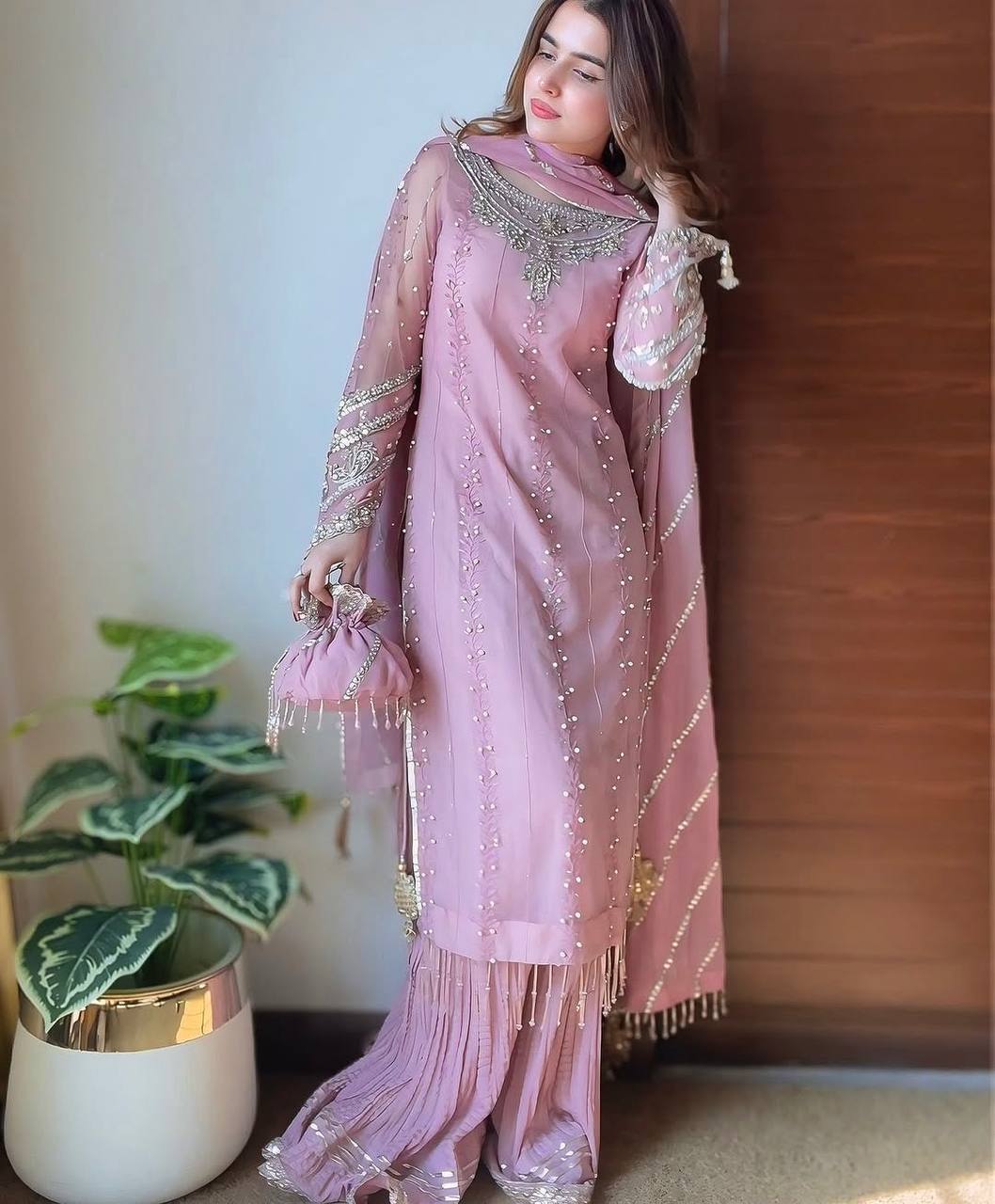 Pink Elegant Faux Georgette Embroidered Plazzo Set with Rivet Moti & Fancy Latkan Detailing