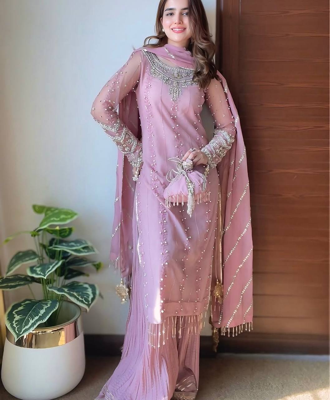 Pink Elegant Faux Georgette Embroidered Plazzo Set with Rivet Moti & Fancy Latkan Detailing