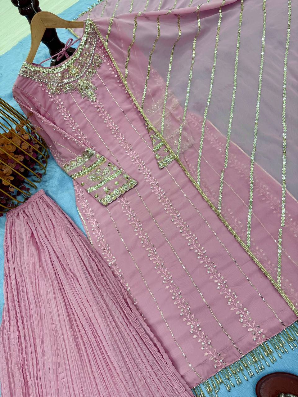 Pink Elegant Faux Georgette Embroidered Plazzo Set with Rivet Moti & Fancy Latkan Detailing