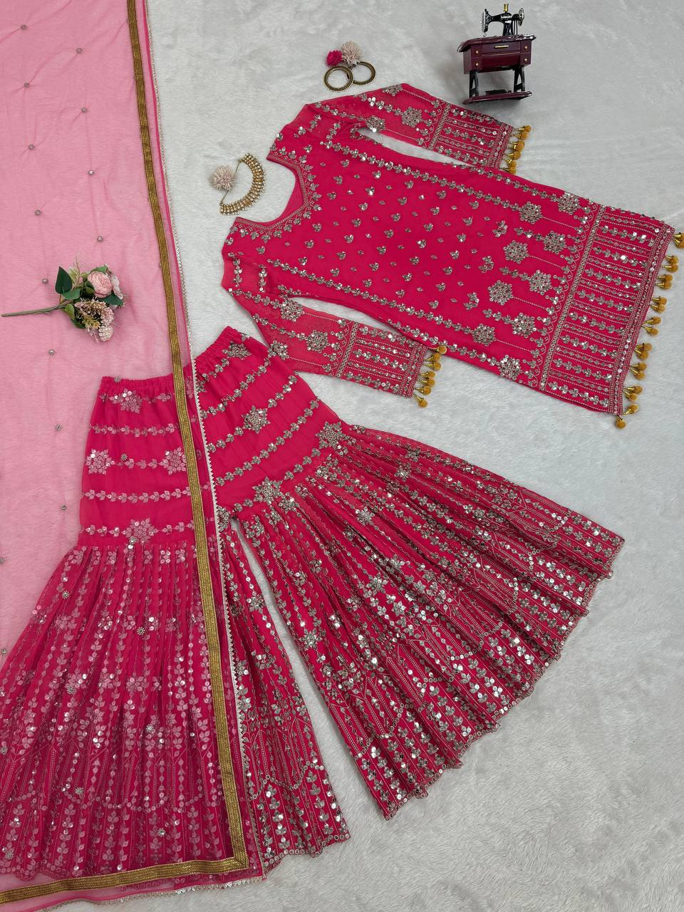 Pink Elegant Faux Georgette Sharara Set with Butterfly Net Dupatta