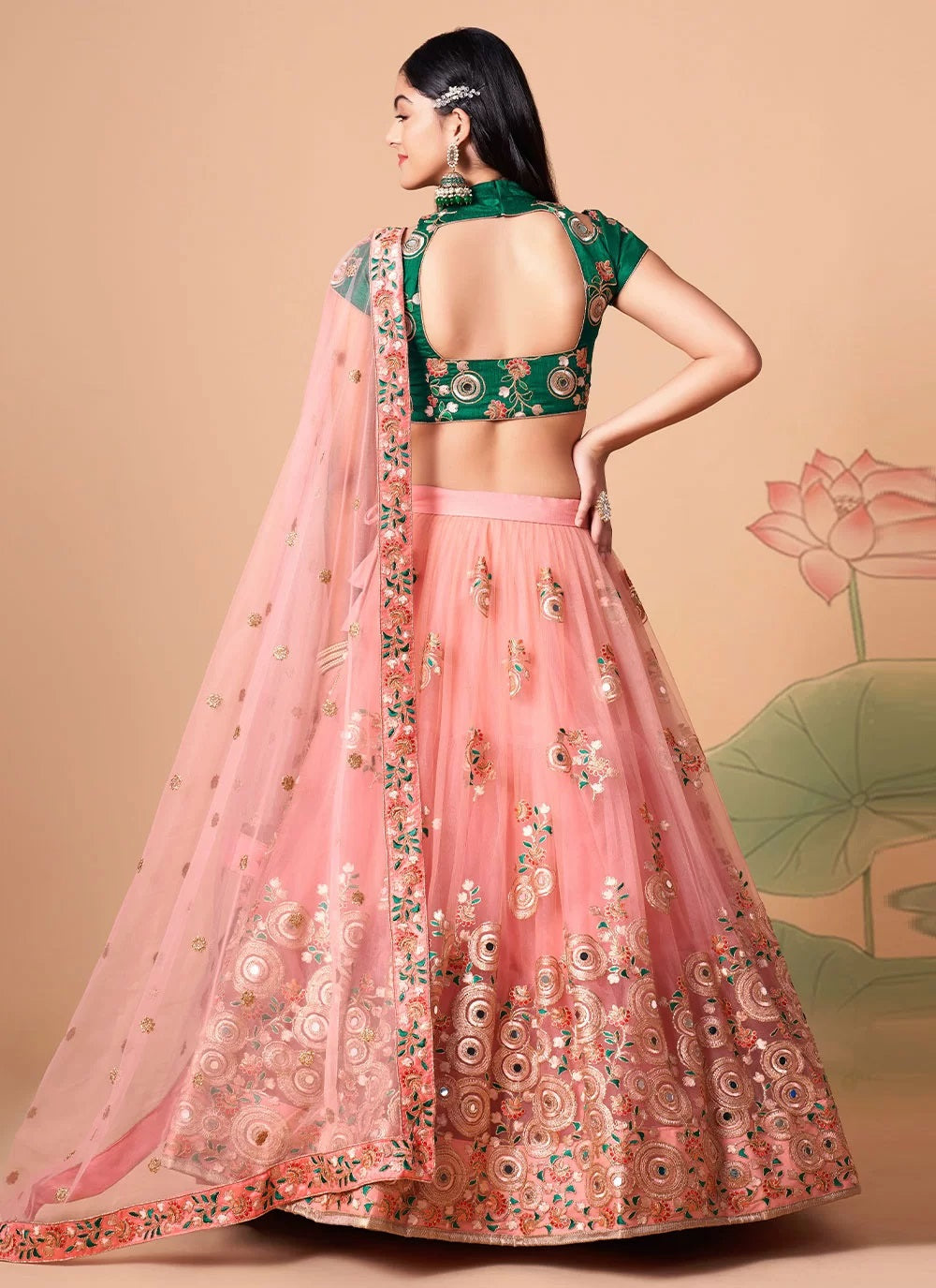 Pink elegant net lehenga with exquisite thread and zari embroidery