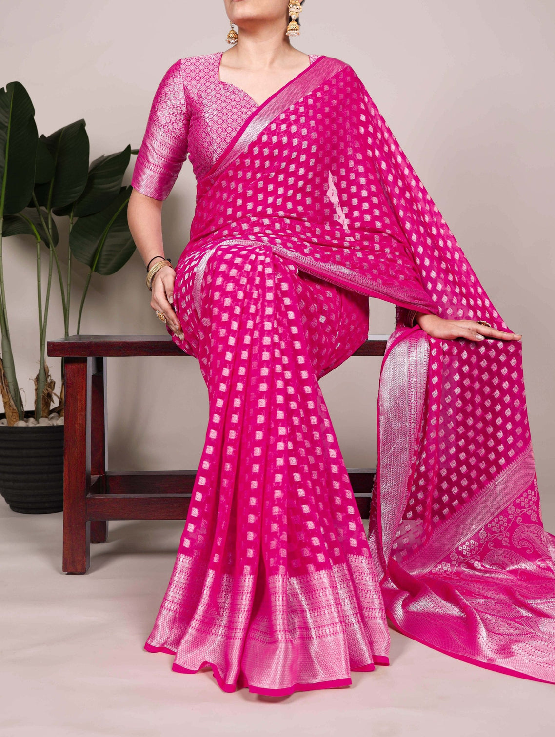 Pink Elegant Nylon Georgette Saree with Zari Weaving & Viscose Border