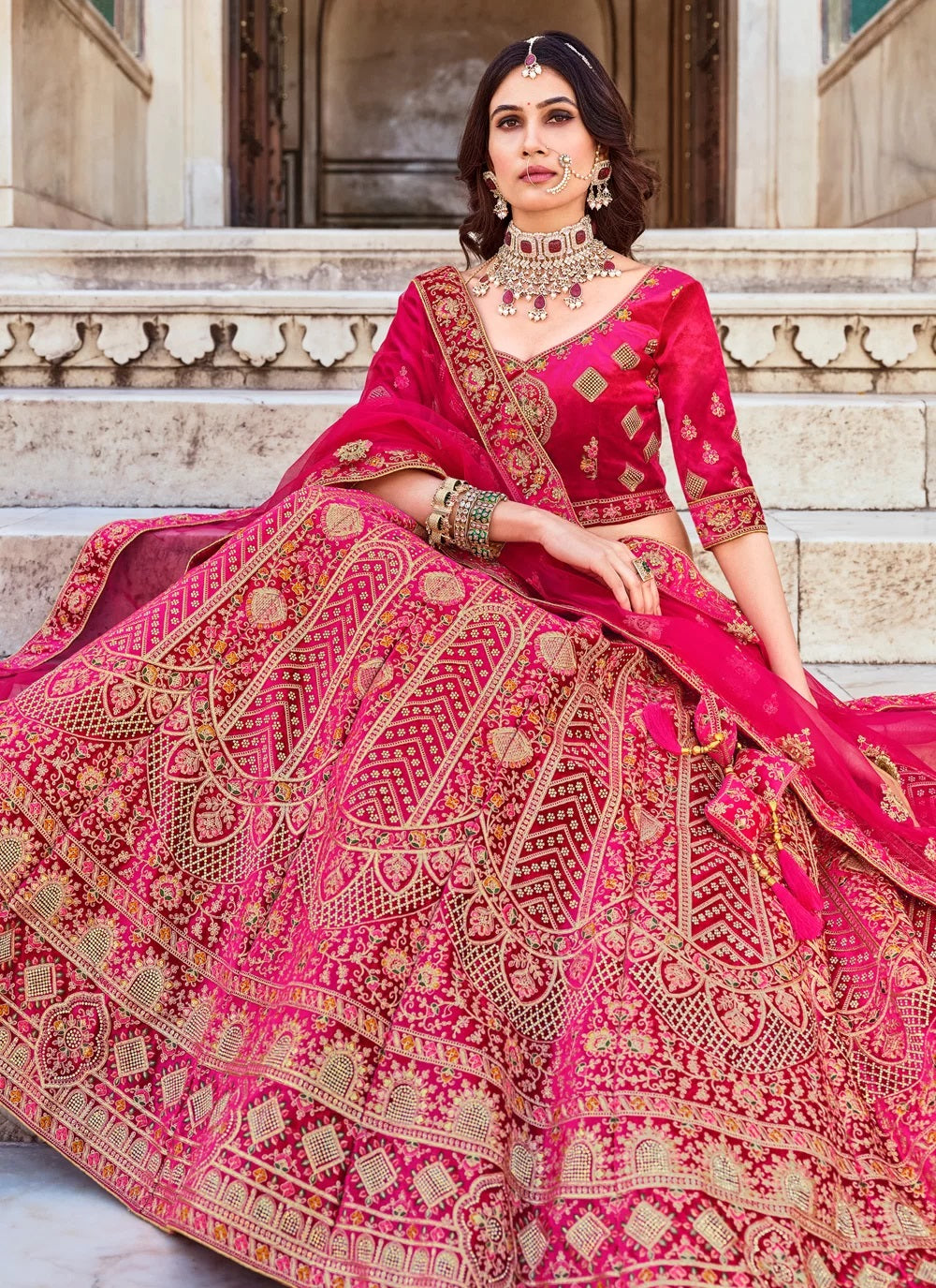 Pink luxurious velvet lehenga with dori zarkan work