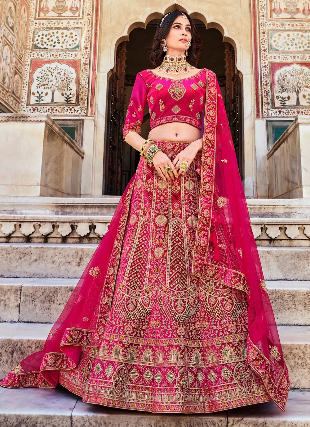 Pink luxurious velvet lehenga with dori zarkan work