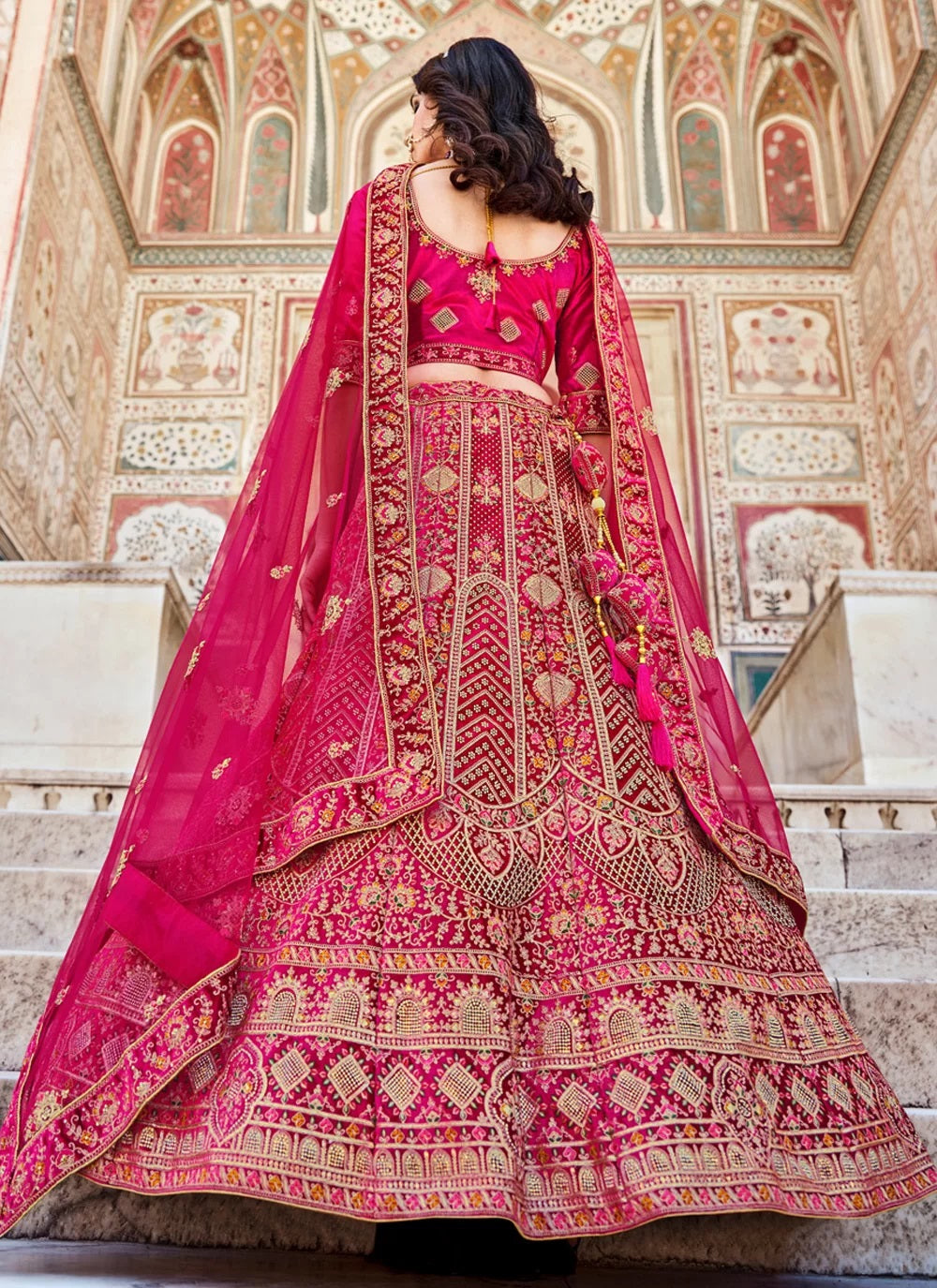 Pink luxurious velvet lehenga with dori zarkan work