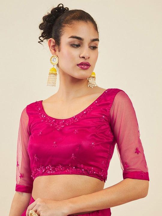 Pink Net embroidered and sequinned Flared lehenga Choli