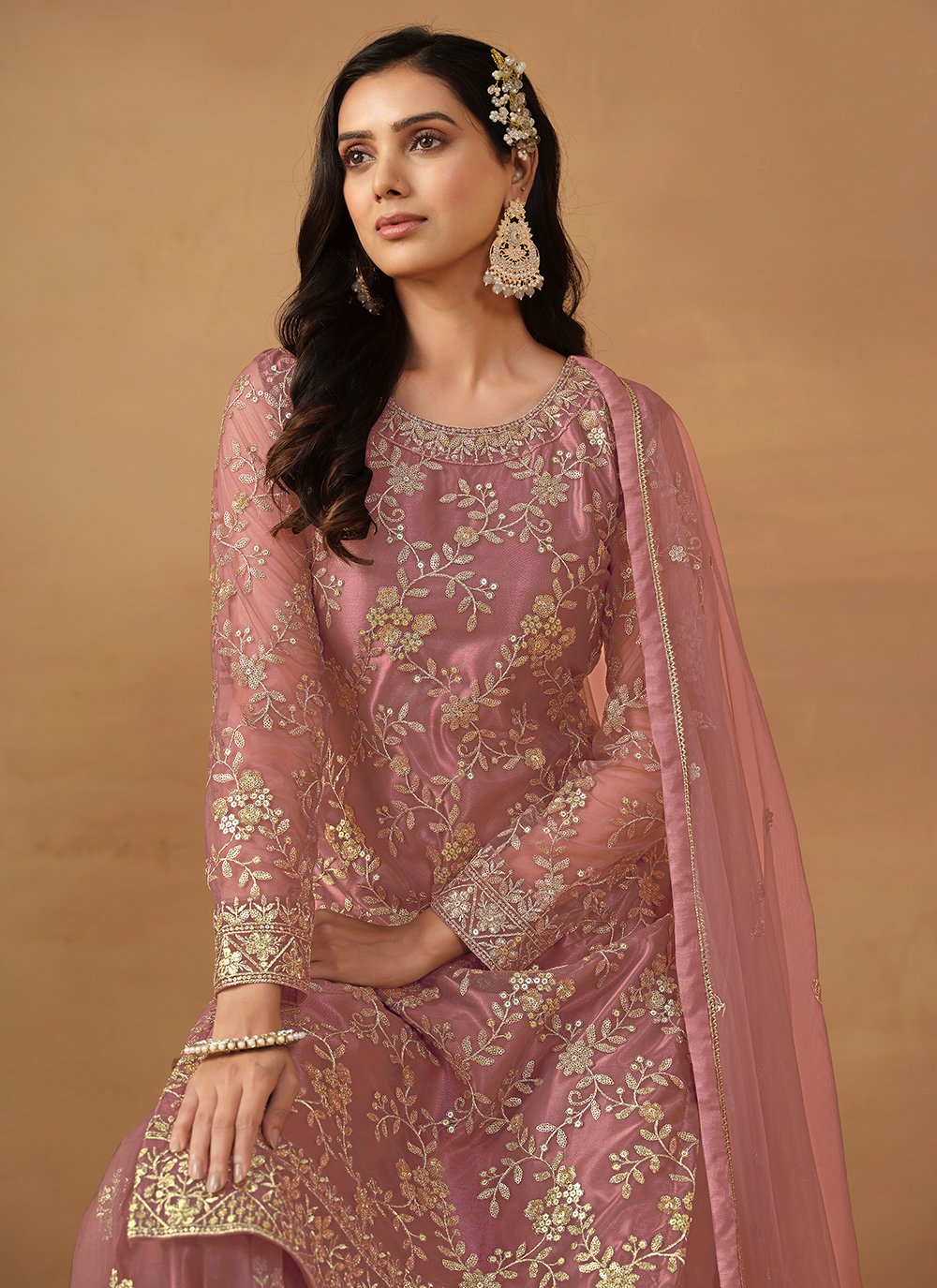 Pink net palazzo salwar suit with sequins embroidery