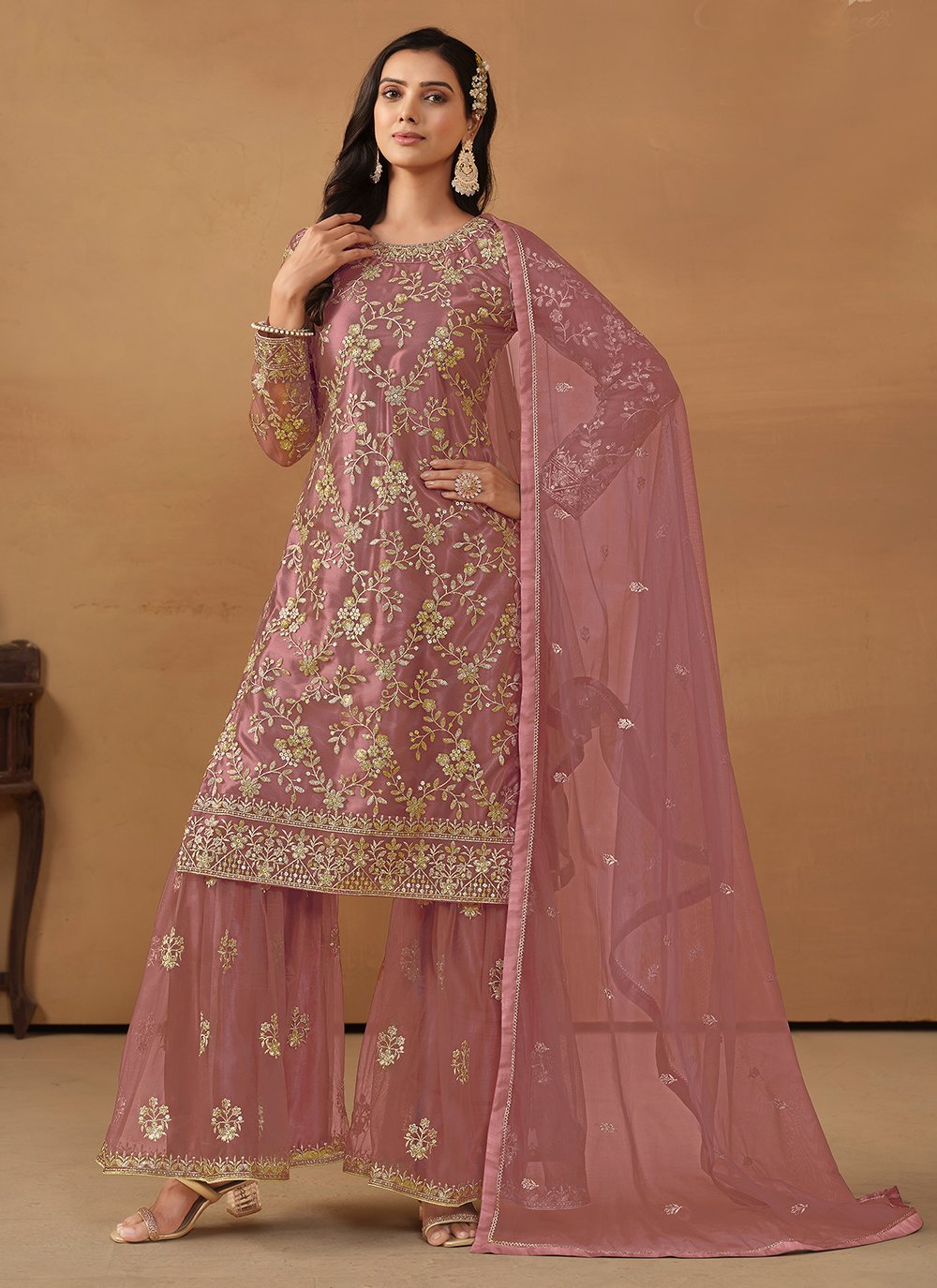 Pink net palazzo salwar suit with sequins embroidery