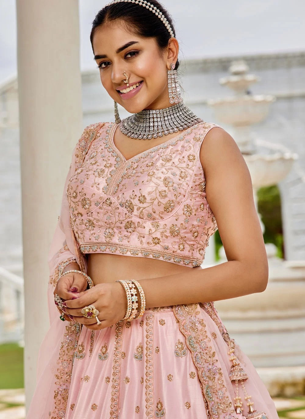Elegant pink silk wedding guest lehenga with sequins embroidery work