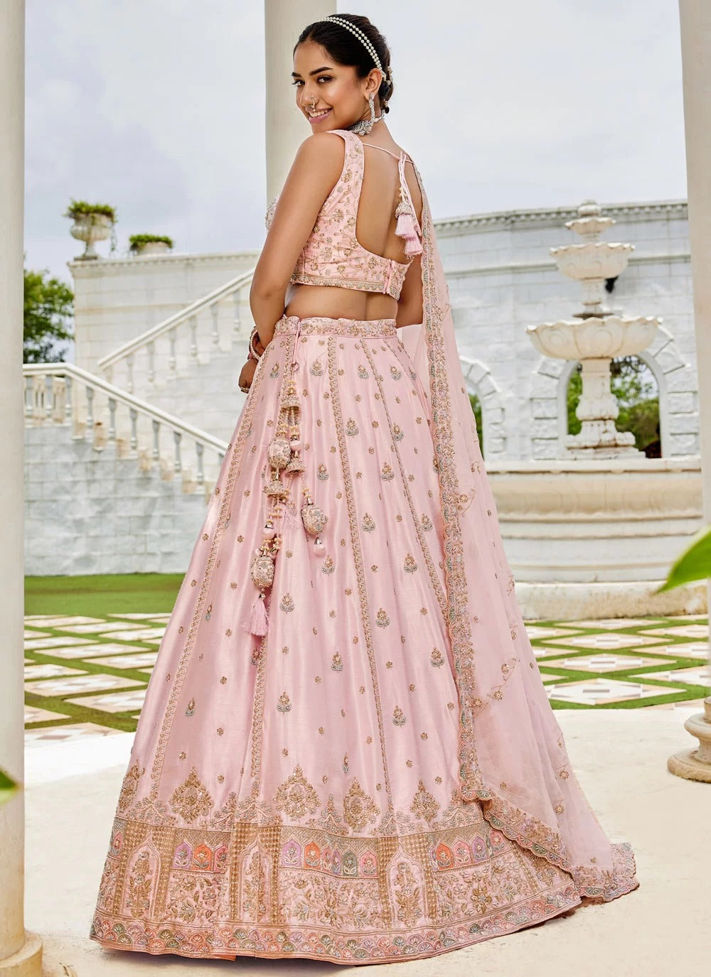 Elegant pink silk wedding guest lehenga with sequins embroidery work
