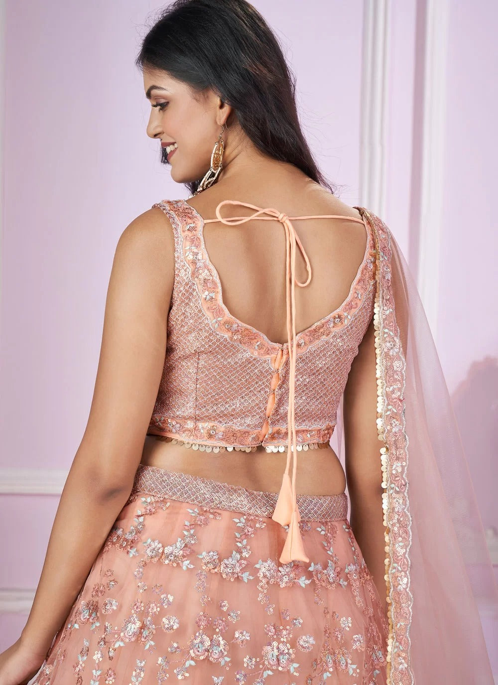 Pink soft net sangeet lehenga choli with sequins zari embroidery