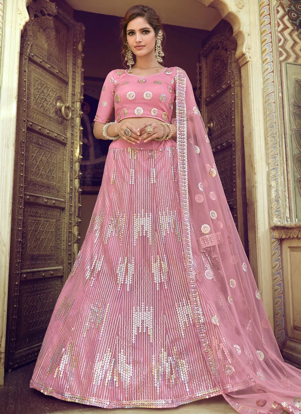Pink soft net marriage lehenga with sequins work