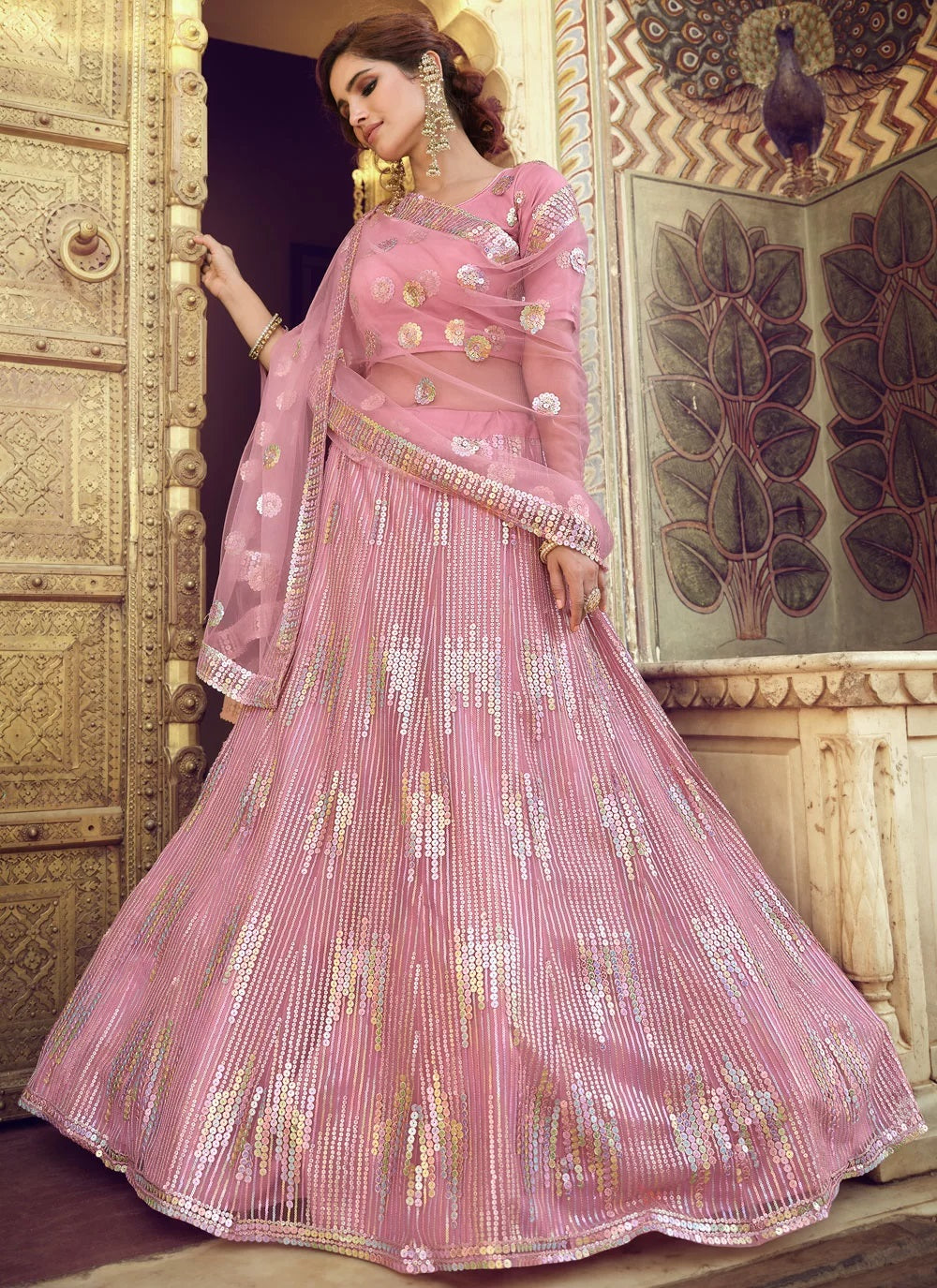 Pink soft net marriage lehenga with sequins work