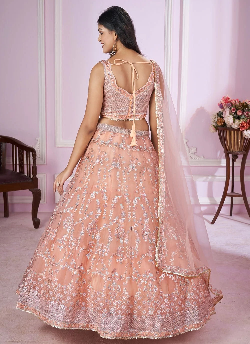 Pink soft net sangeet lehenga choli with sequins zari embroidery