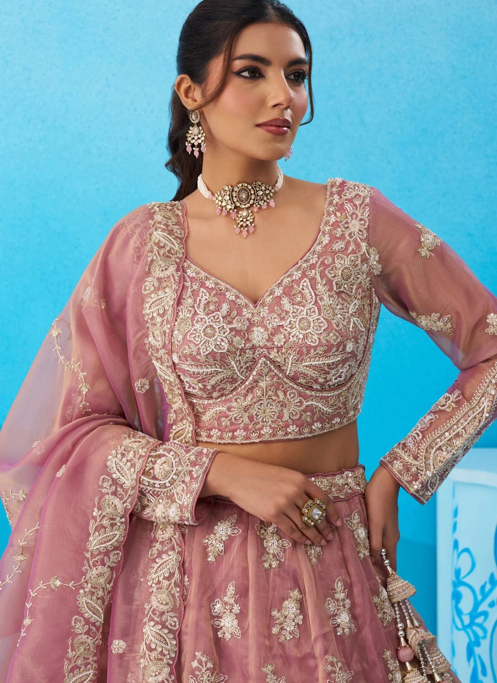 Pink tissue bridal lehenga with sequins coding embroidery