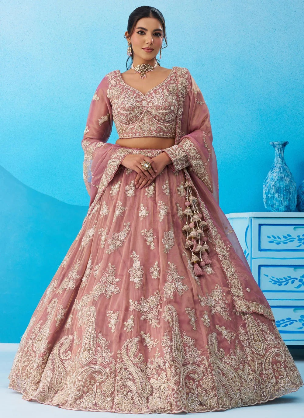 Pink tissue bridal lehenga with sequins coding embroidery