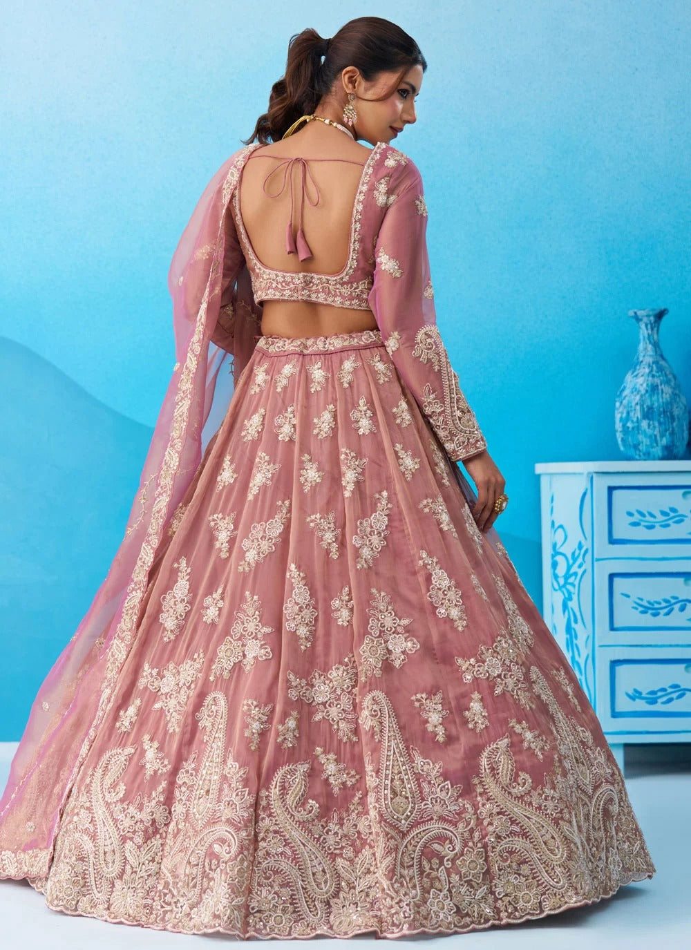 Pink tissue bridal lehenga with sequins coding embroidery