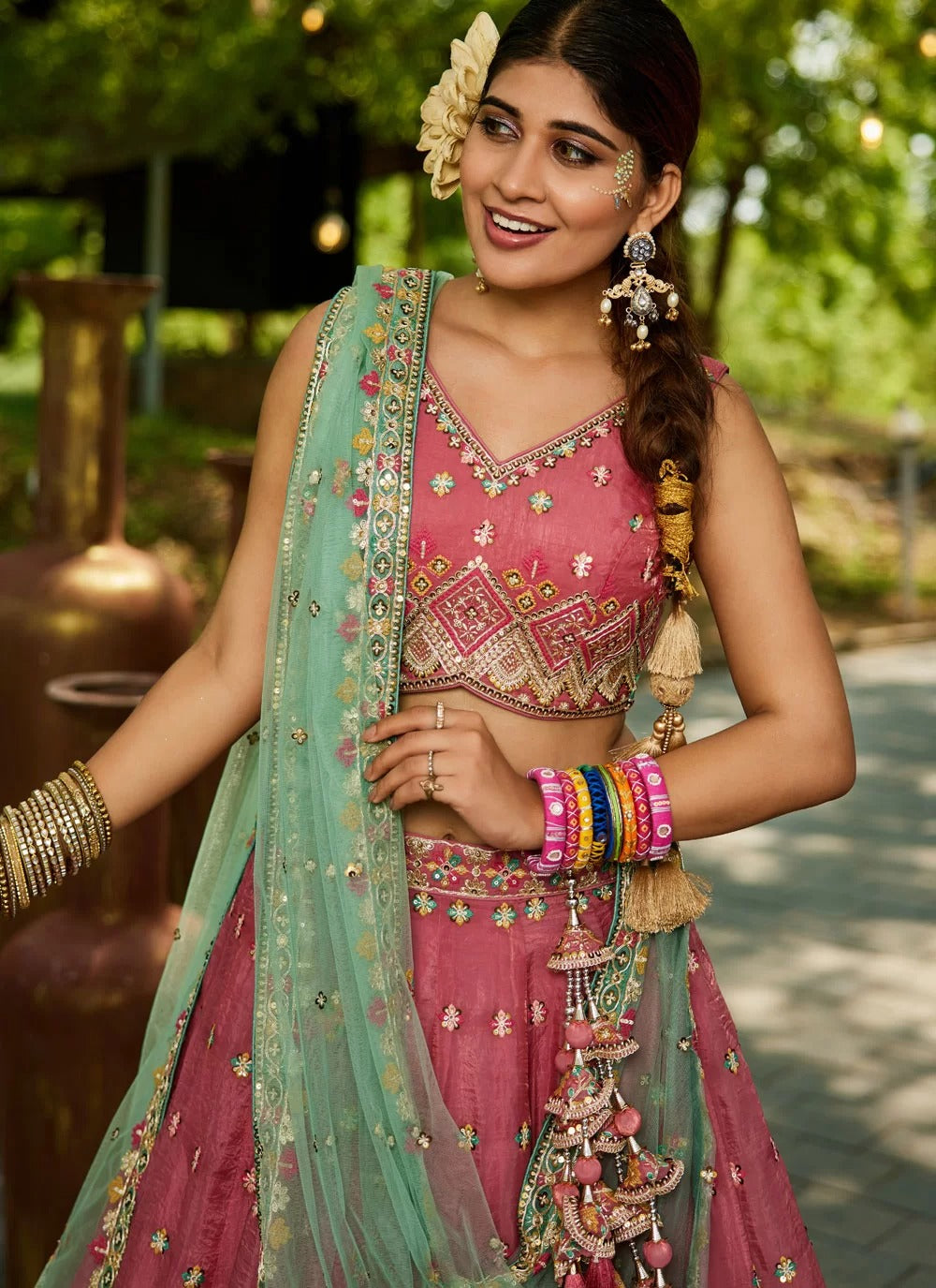Gorgeous pink tissue sequinned lehenga choli with net dupatta for wedding party wear