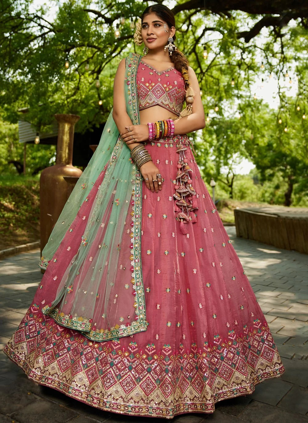 Gorgeous pink tissue sequinned lehenga choli with net dupatta for wedding party wear