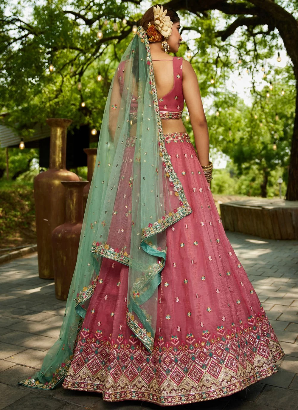 Gorgeous pink tissue sequinned lehenga choli with net dupatta for wedding party wear