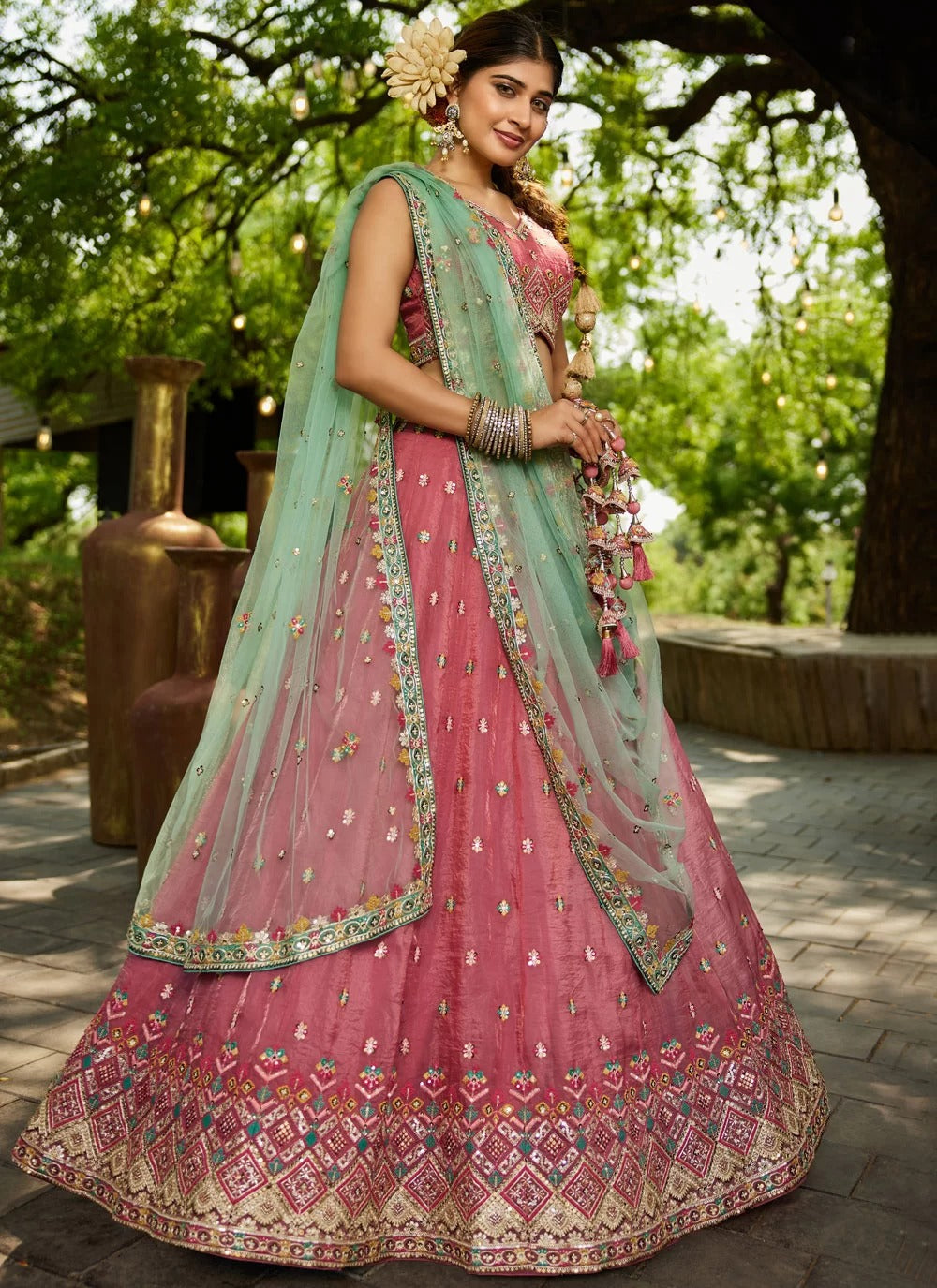 Gorgeous pink tissue sequinned lehenga choli with net dupatta for wedding party wear