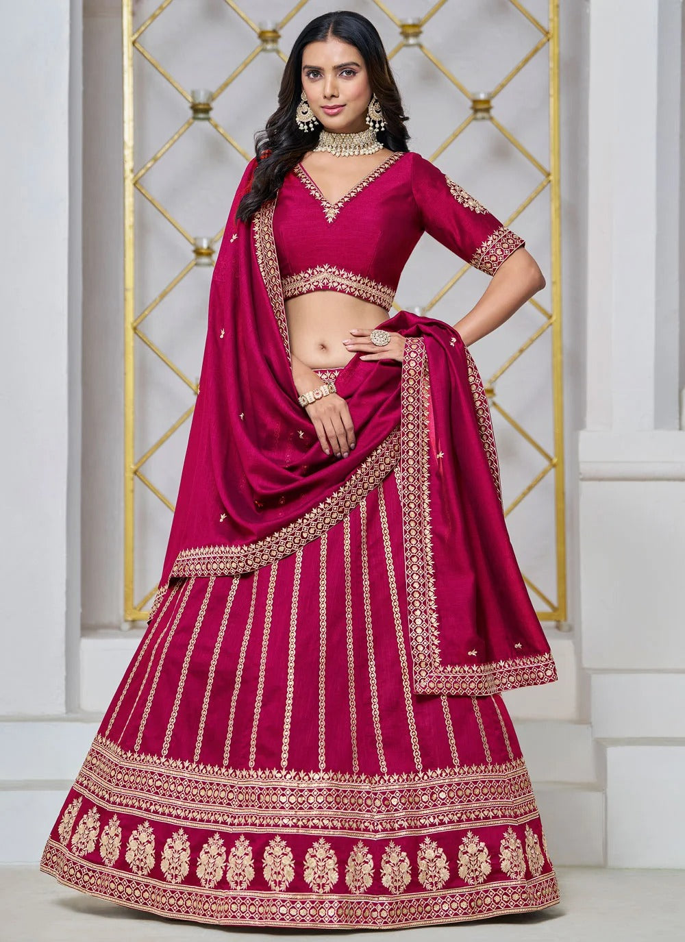 Rani pink lehenga for wedding in art silk with embroidery
