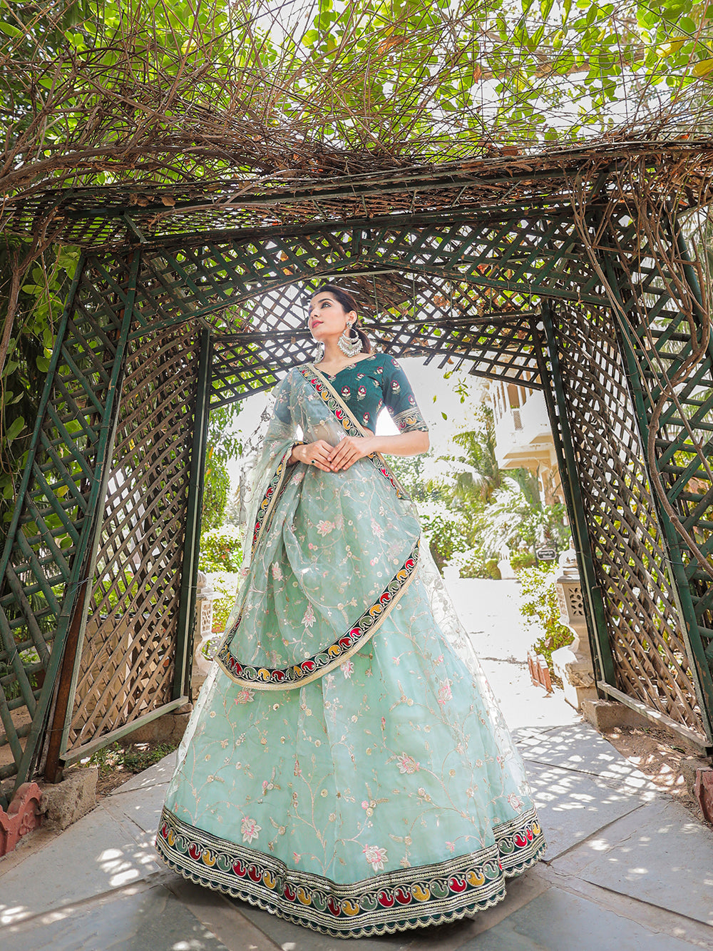 Pista Color Thread Embroidery Work With Lace Border Organza Lehenga Choli