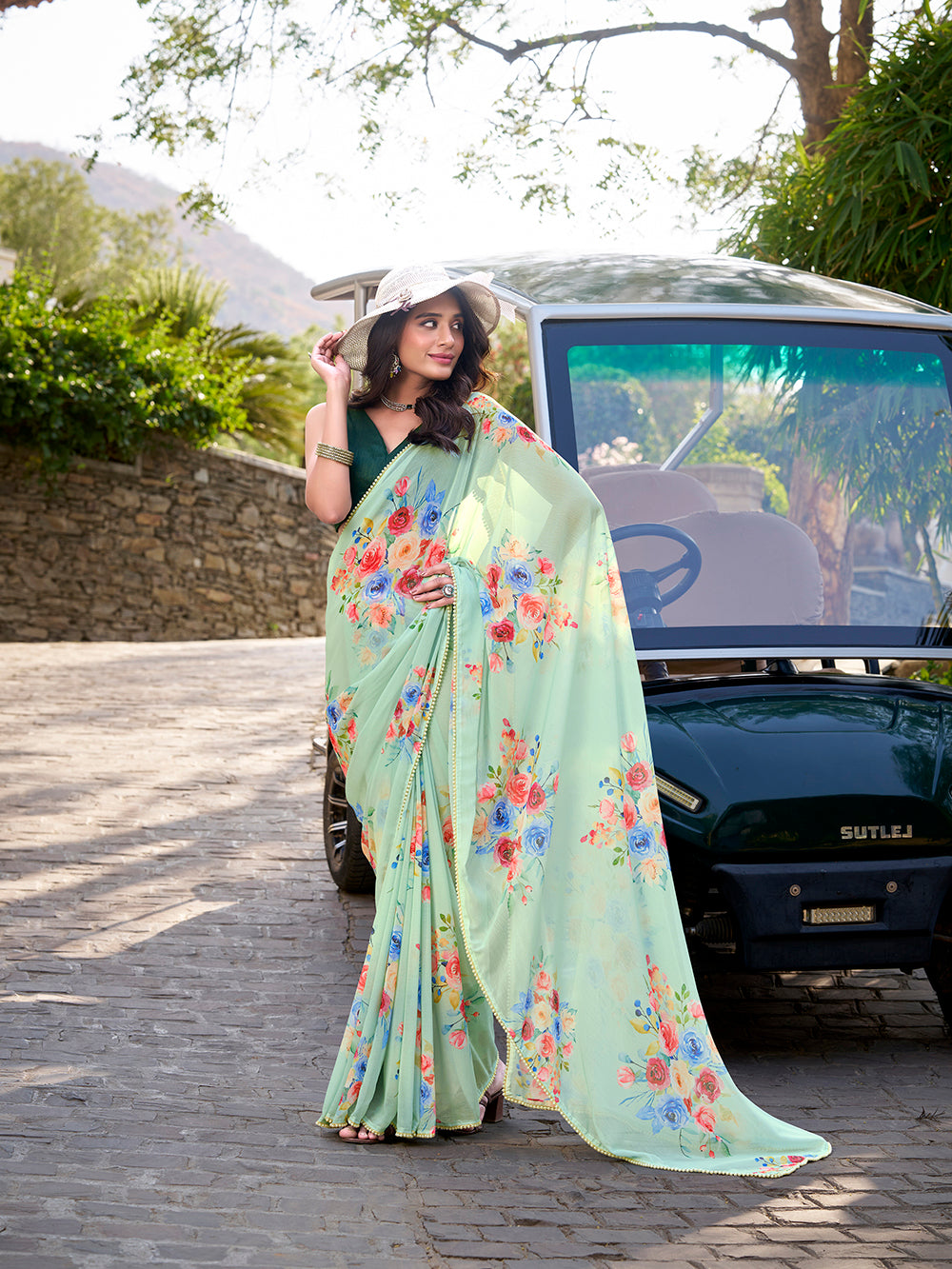 Pista floral printed weightless marbal saree with pearl lace border