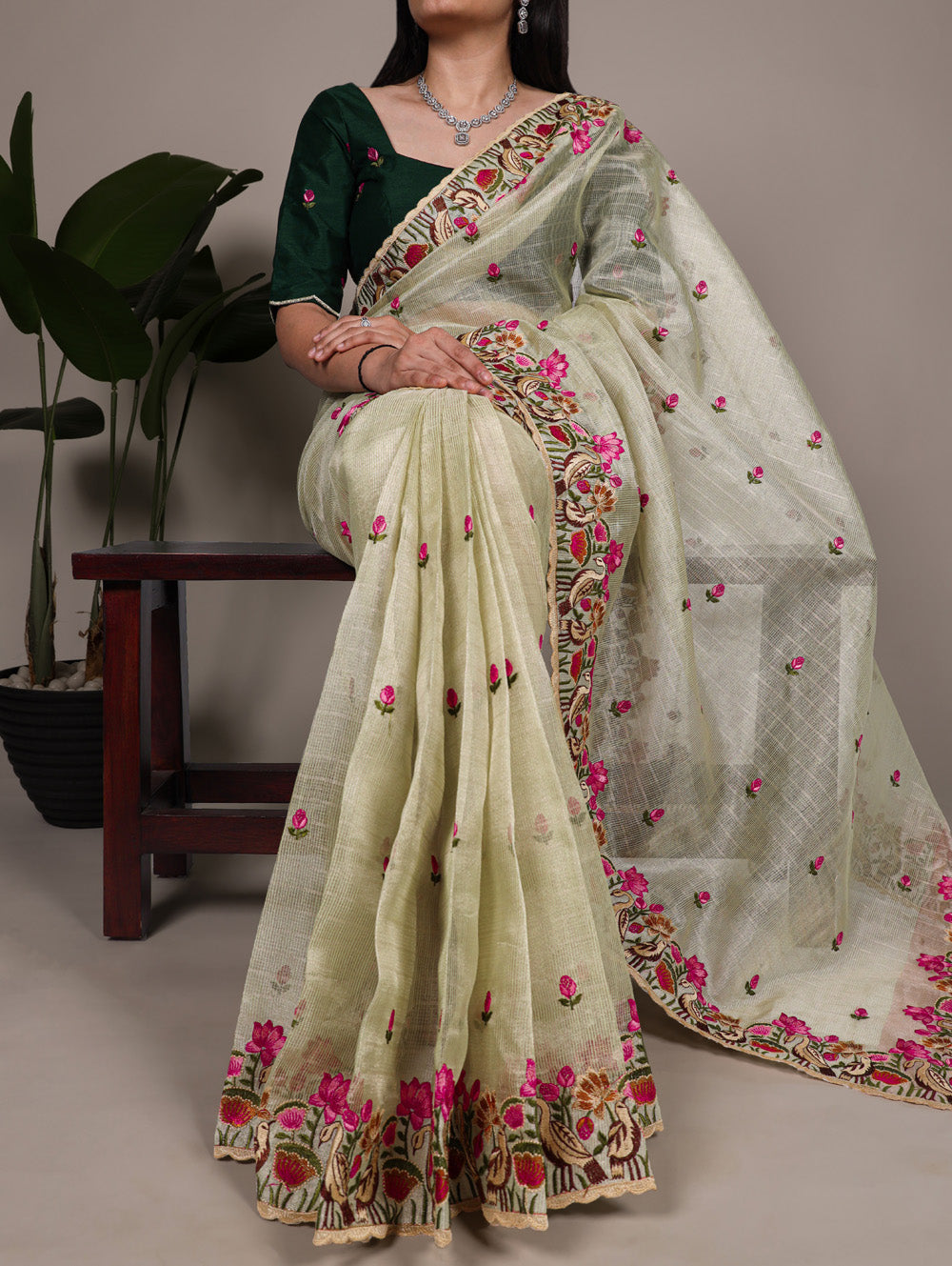Pista green zari kota tissue saree with floral thread embroidery and banglory blouse fabric