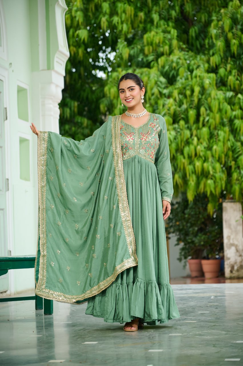 Pista Green Elegant Vichitra Silk Gown with Rich Zari & Thread Embroidery and Dupatta – Designer Full-Sleeve Frill Gown