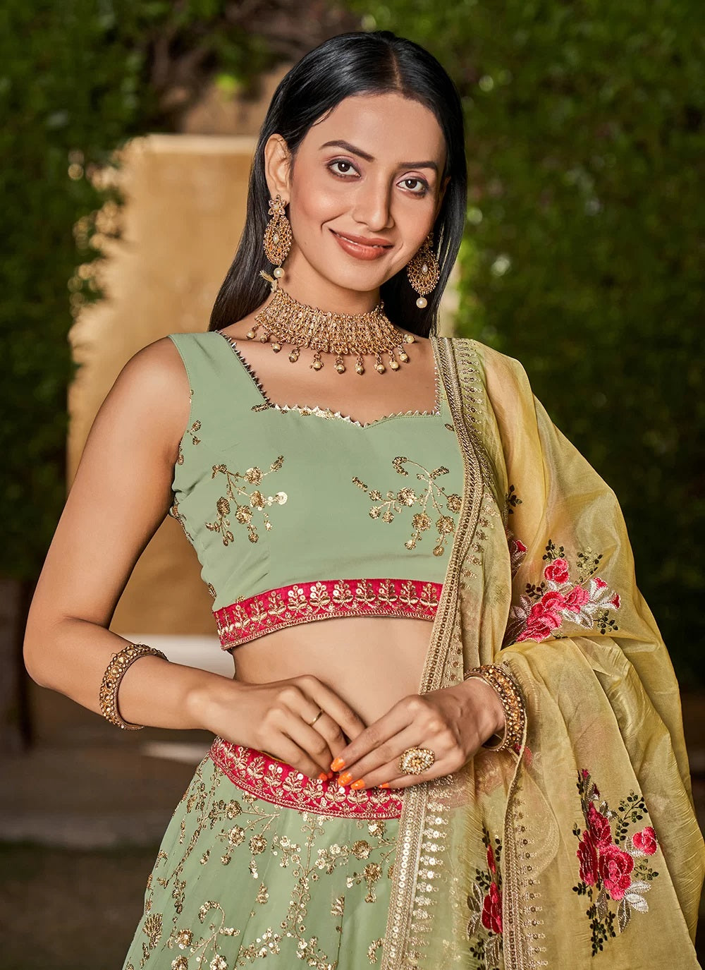 Pista yellow georgette sequins and zari work engagement lehenga
