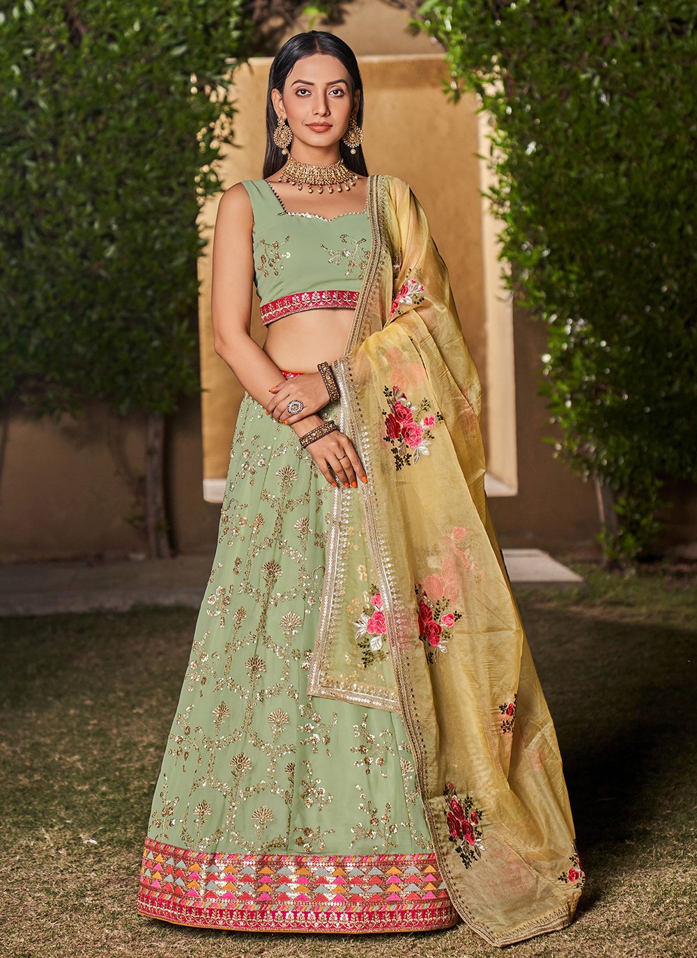 Pista yellow georgette sequins and zari work engagement lehenga