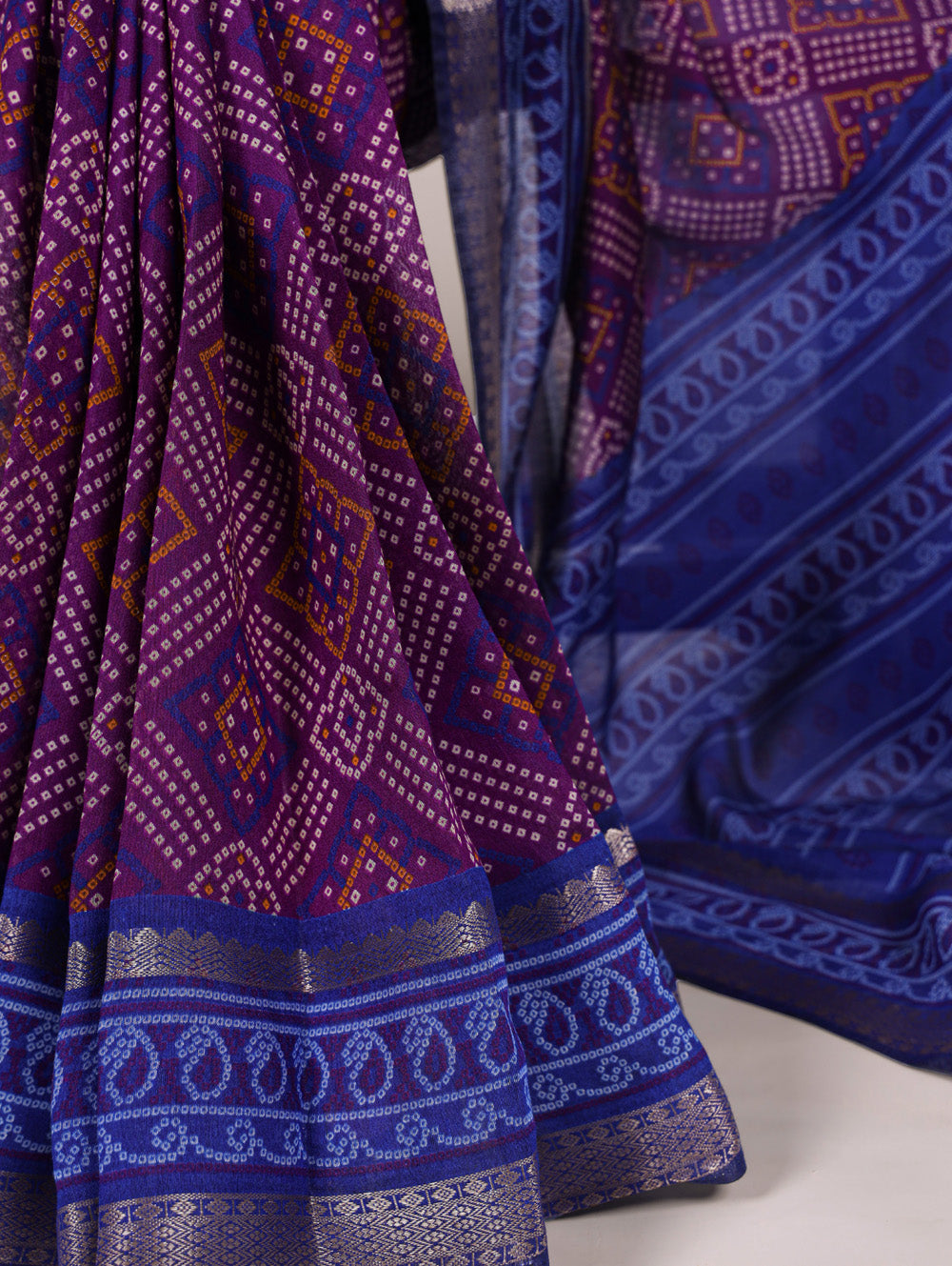Purple viscose chanderi bandhej print saree with zari weaving border blouse piece