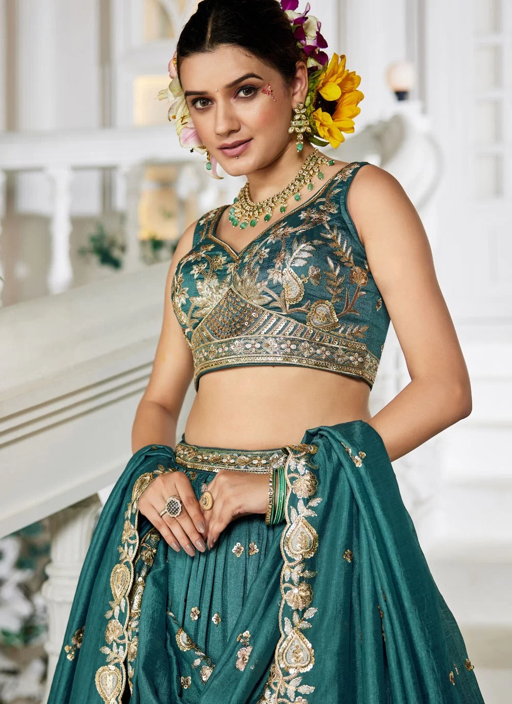 Prestigious teal georgette lehenga with sequins embroidery