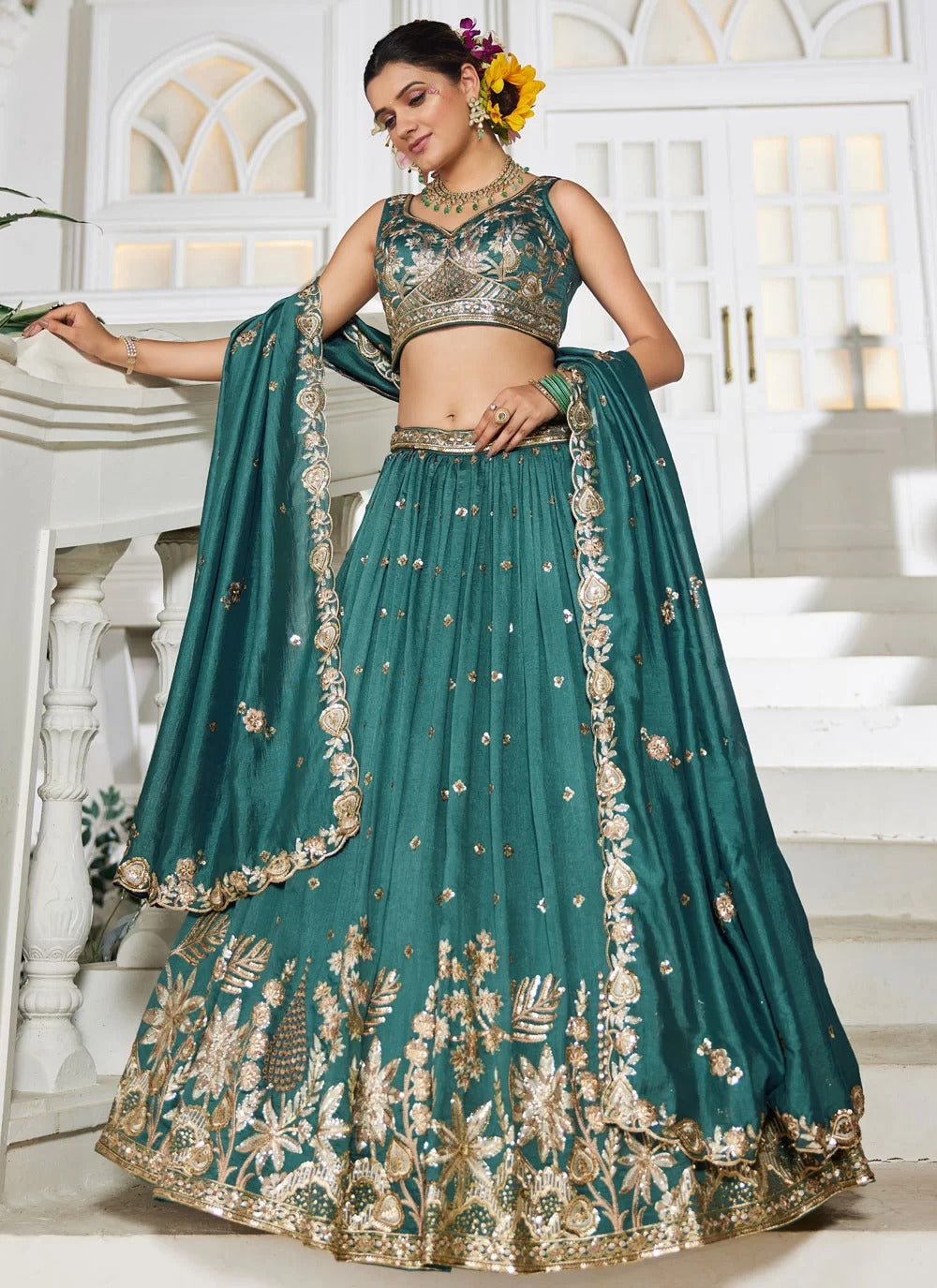 Prestigious teal georgette lehenga with sequins embroidery