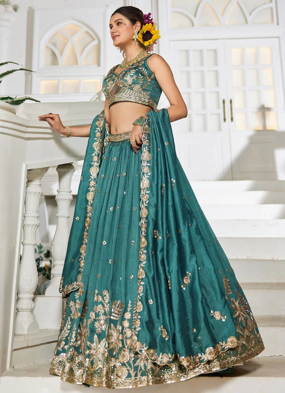 Prestigious teal georgette lehenga with sequins embroidery