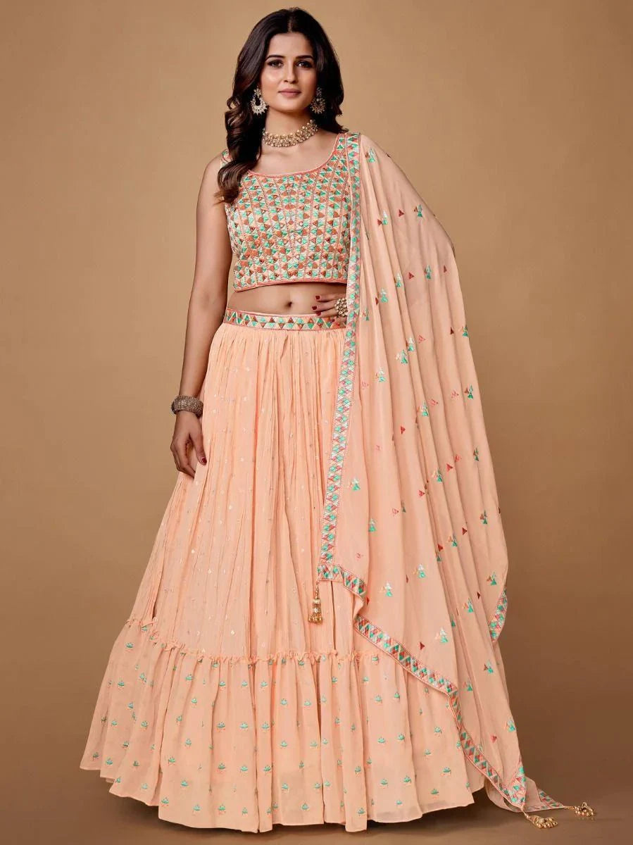 Pretty Peach Embroidered Georgette Reception Wear Lehenga Choli