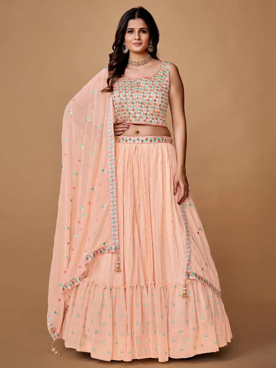 Pretty Peach Embroidered Georgette Reception Wear Lehenga Choli