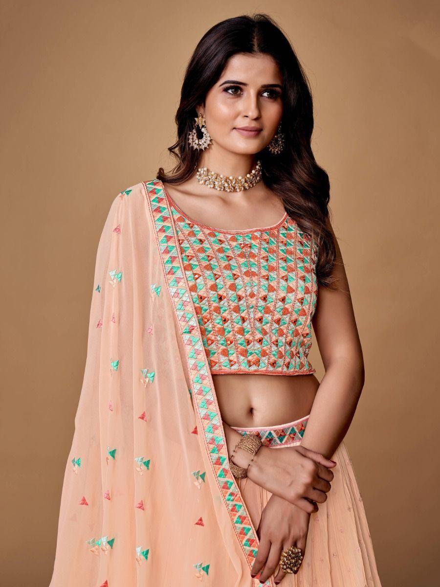 Pretty Peach Embroidered Georgette Reception Wear Lehenga Choli