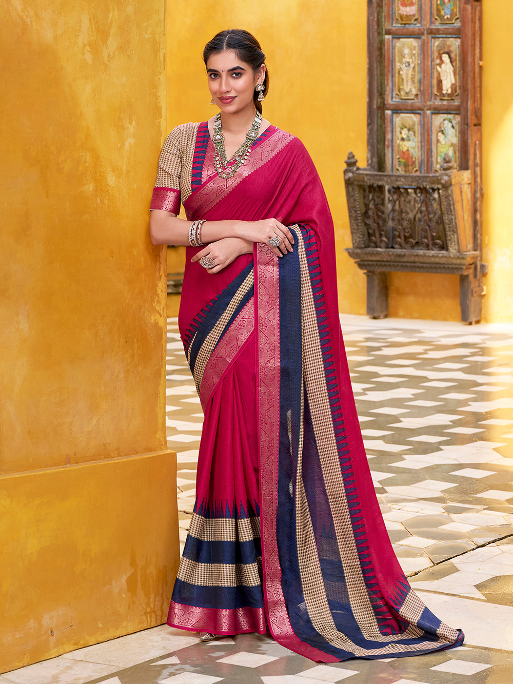 Pink printed poly cotton saree with zari weaving and temple pallu