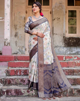 Elegant Gray Banarasi Silk Saree with Navy Blue Zari Weave, Floral Design, and Tassels